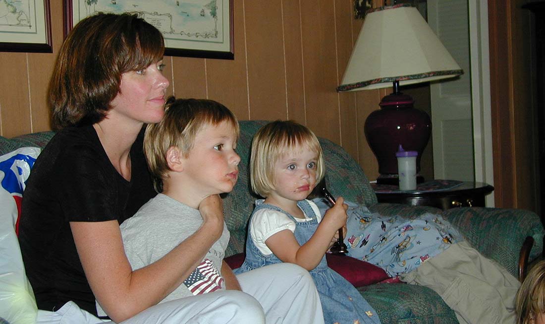 Jennifer and kids on sofa