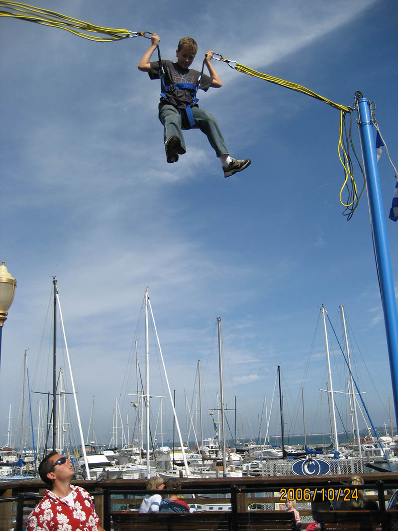 Ryan jumping at Fisherman's Wharf